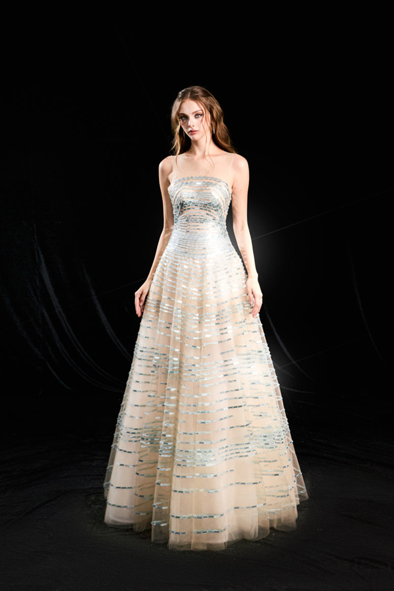 HACCHIC COUTURE Aurelian linear sequin tulle gown in champagne, elegant floor-length dress with shimmering embellishments.