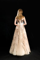 HACCHIC COUTURE Aurelia radiant sequin strapless gown in champagne gold, elegant evening dress with shimmering embellishments.