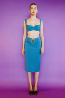 Blue-green Anne bra top by IKINITA, featuring soft fabric and stylish design, shown in a close-up image.