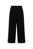 Black wool culottes pants with a silk belt from ELENAREVA, shown on a plain background.