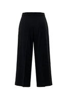 Black wool culottes pants with a silk belt from ELENAREVA, shown on a model, featuring a stylish wide-leg silhouette.