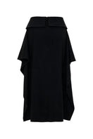 Black wool midi skirt from ELENAREVA, shown with a fitted waist and straight silhouette, styled for a versatile look.