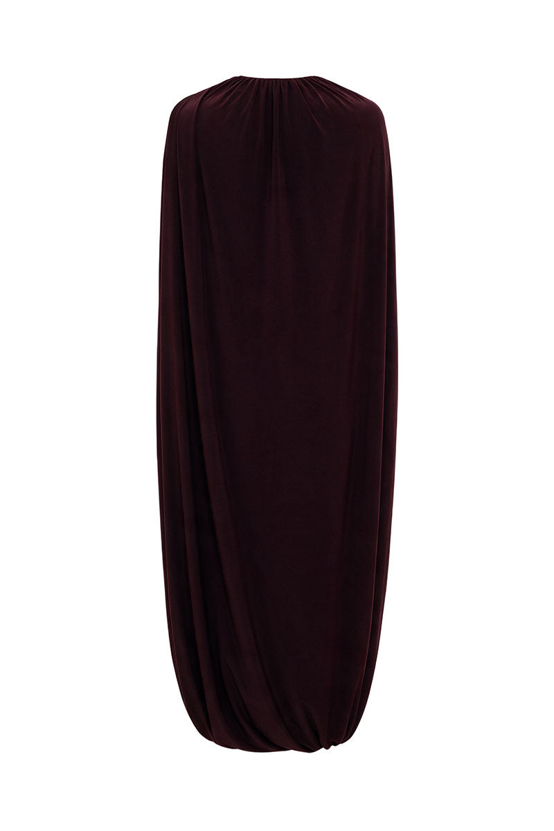 Elegant burgundy jersey midi dress with attached cape by ELENAREVA, featuring a flowing silhouette and stylish design.