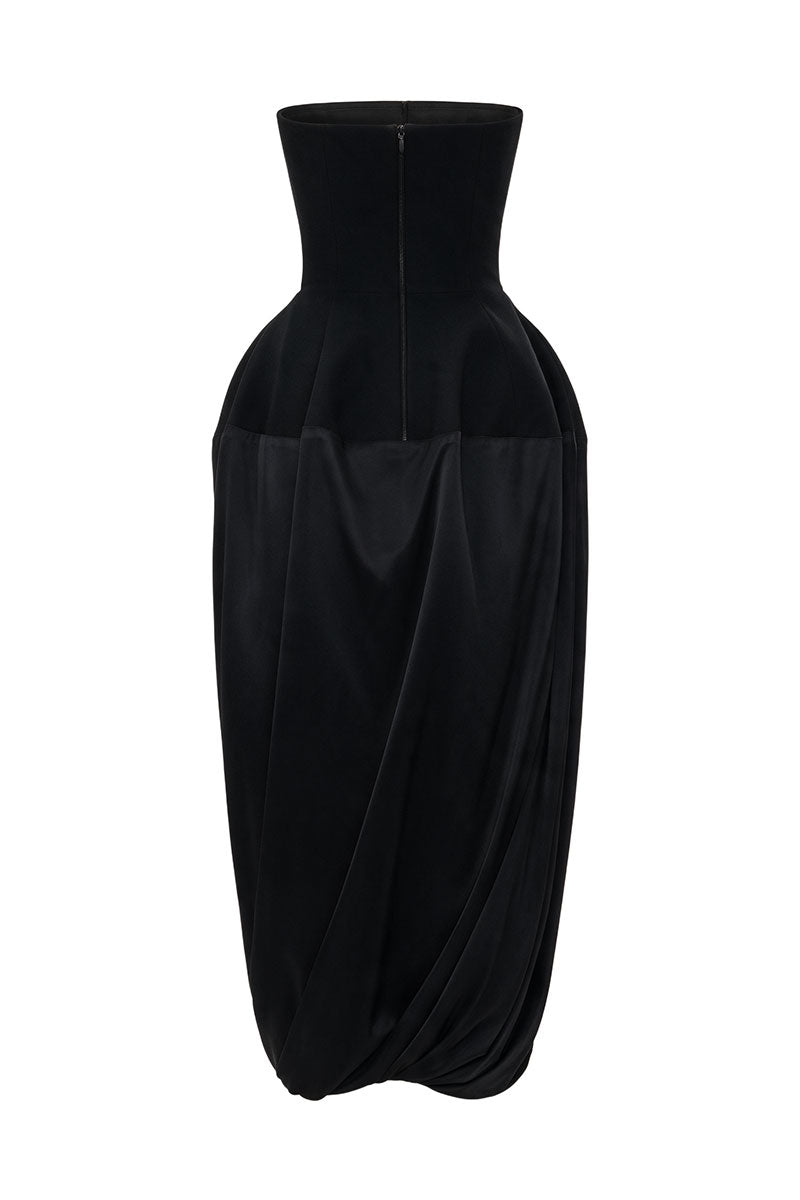 Black wool bustier midi dress with silk skirt from ELENAREVA, shown on a hanger with a smooth background.