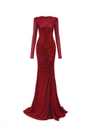Red glitter stretch gown by Lune De Soie featuring a fitted silhouette and elegant design, perfect for formal occasions.