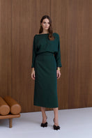 Undress Agalia deep green off-the-shoulder midi dress with fitted bodice and flowing skirt, perfect for elegant occasions.