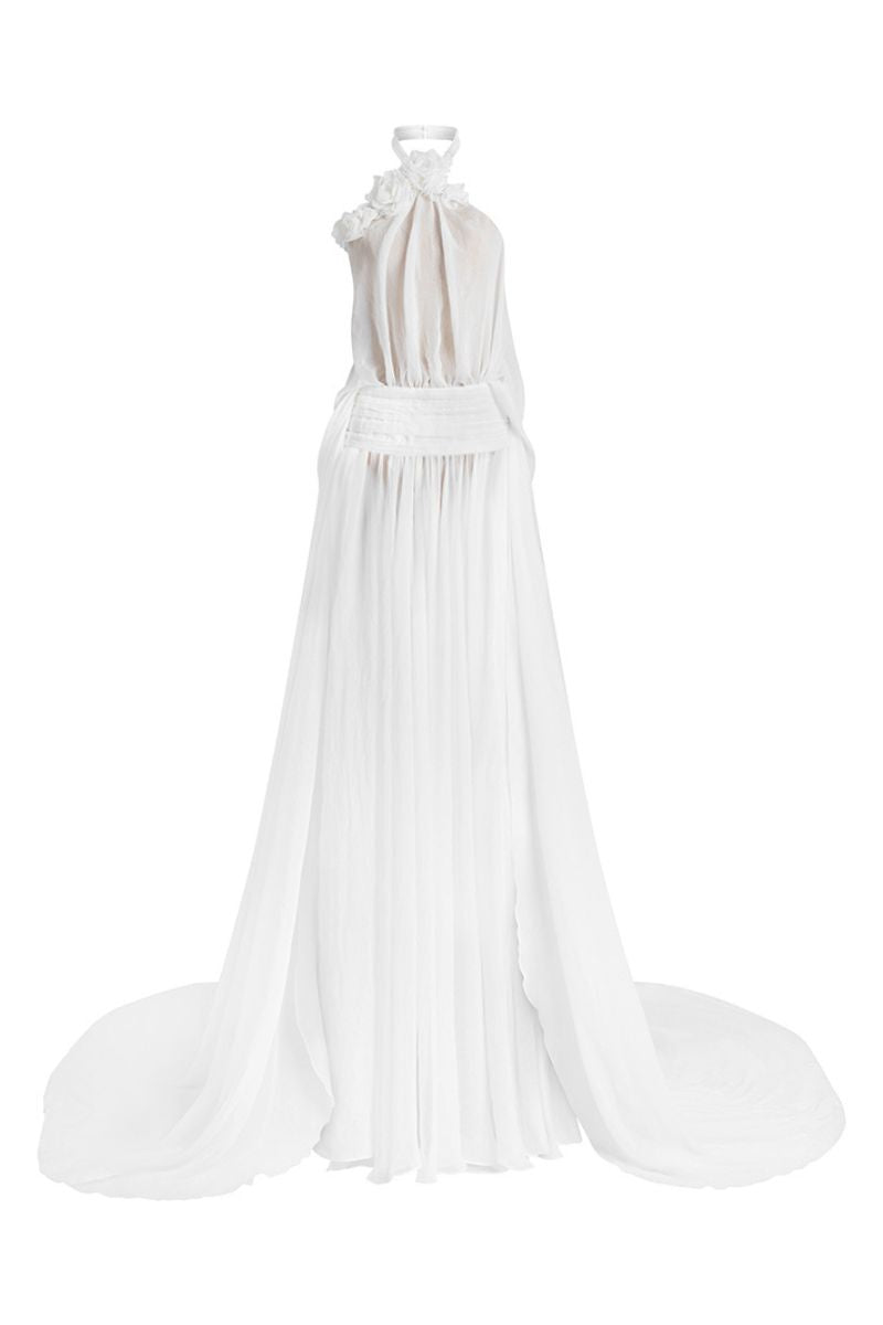 White Glacial Grace gown by Le Thanh Hoa featuring elegant flowing fabric and intricate detailing for formal occasions.