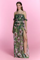 Nur Karaata silk heirloom beach dress, a flowing maxi dress with intricate patterns and lightweight fabric, suitable for warm weather.