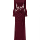 Elegant burgundy crystal silk long sleeve gown by Tracy Studio, featuring flowing fabric and intricate detailing.