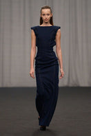 Lili Blanc elegant denim pencil gown with fitted silhouette, sleeveless design, and classic neckline, styled for a sophisticated look.