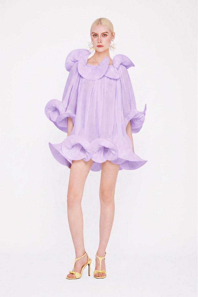 Purple Valenciani Origami Cloud Mini Dress with a flowy, structured design, displayed on a hanger against a neutral background.