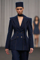 Lili Blanc double-breasted tailored denim blazer with structured fit and classic collar, displayed on a neutral background.