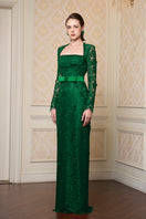 Green I.H.F trapeze long sleeve gown with a flowing silhouette, featuring wide sleeves and a relaxed fit.