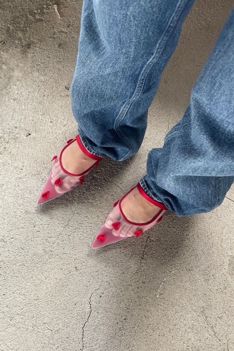 Christin Wu Wynne Flats showing beige fabric with elegant pointed toes and subtle bow details, perfect for casual or dressy wear.