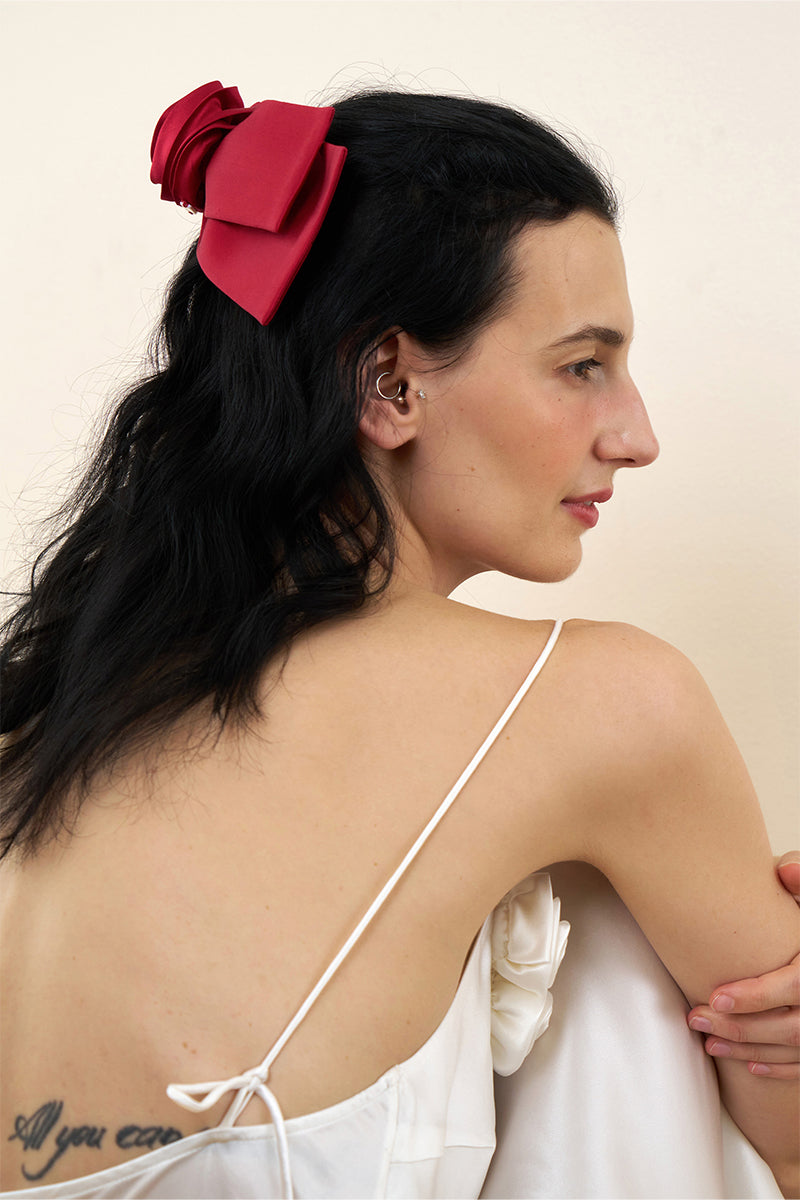 Two Tuscan Rose Bow Silk Hair Clips by Not Just Pajama, showcasing elegant pink silk bows for stylish hair accessories.