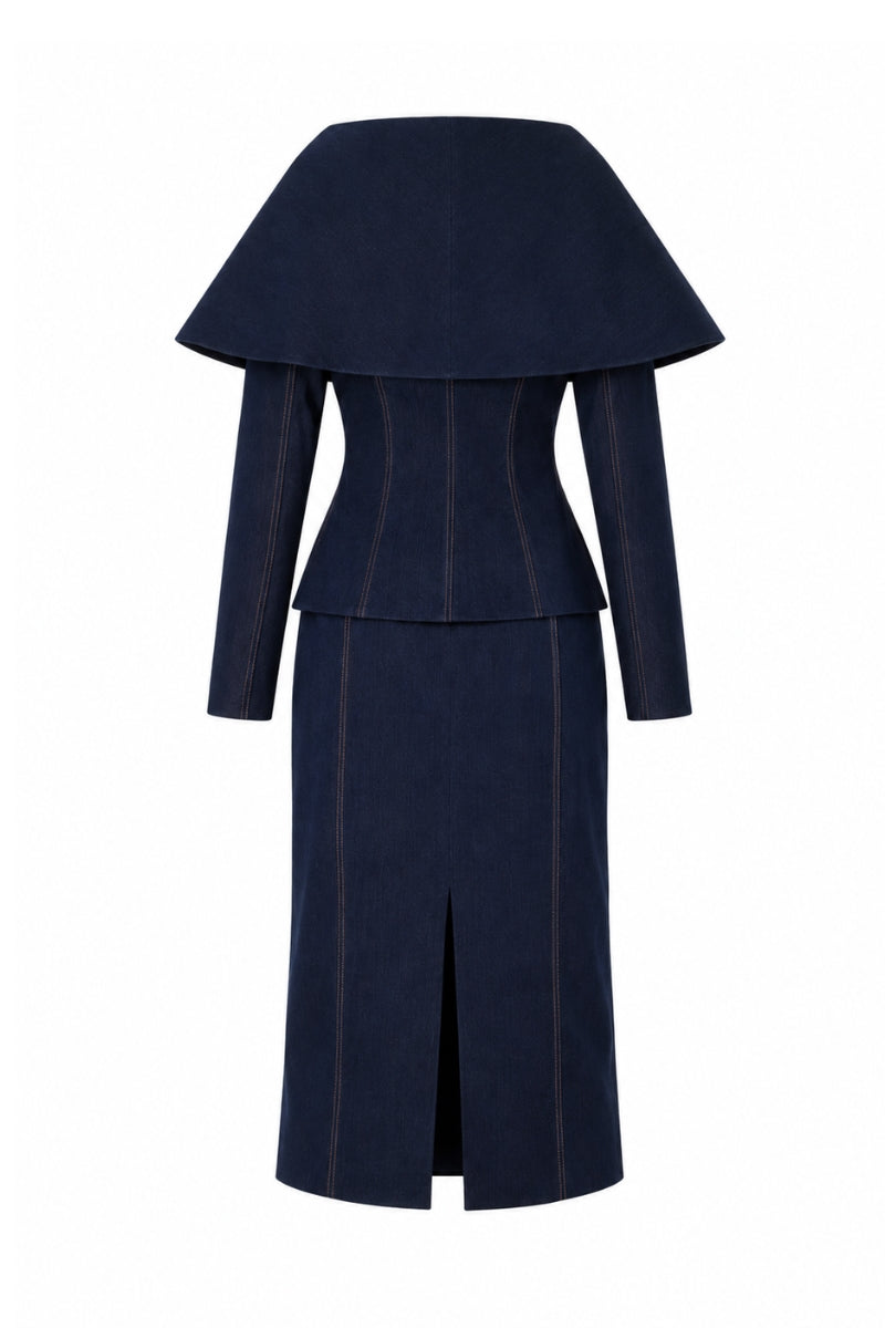 Lili Blanc LINEA denim midi skirt with classic blue wash, high waist, and side pockets, styled with a casual top.