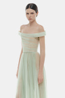 Mint off-shoulder midi dress by Montsand, featuring a flowy silhouette and elegant design, perfect for summer or special occasions.