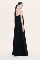 Nihan Peker Siena strapless gown in elegant fabric, featuring a fitted bodice and flowing skirt for formal occasions.