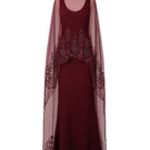 Raishma Aurelia Gown featuring elegant fabric and intricate design, displayed on a hanger with a neutral background.