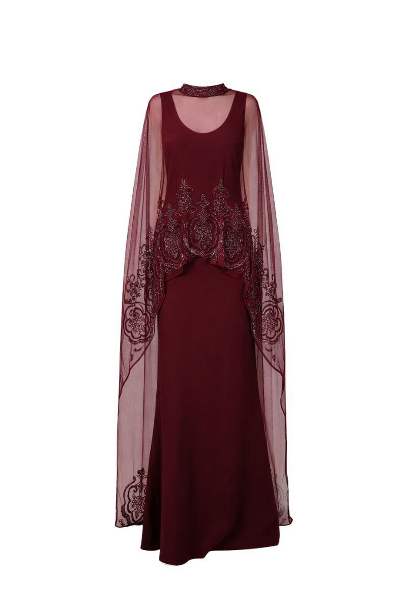 Raishma Aurelia Gown featuring elegant fabric and intricate design, displayed on a hanger with a neutral background.
