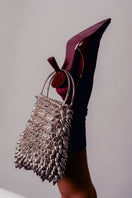 Millanne Tale IONA Silver Top Handle Bag with sleek design, silver finish, and sturdy top handle for elegant carrying.