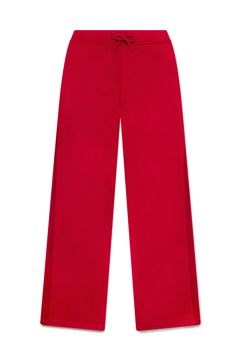 Red women's pants by La Granni, shown with a relaxed fit and stylish design, perfect for casual or chic outfits.