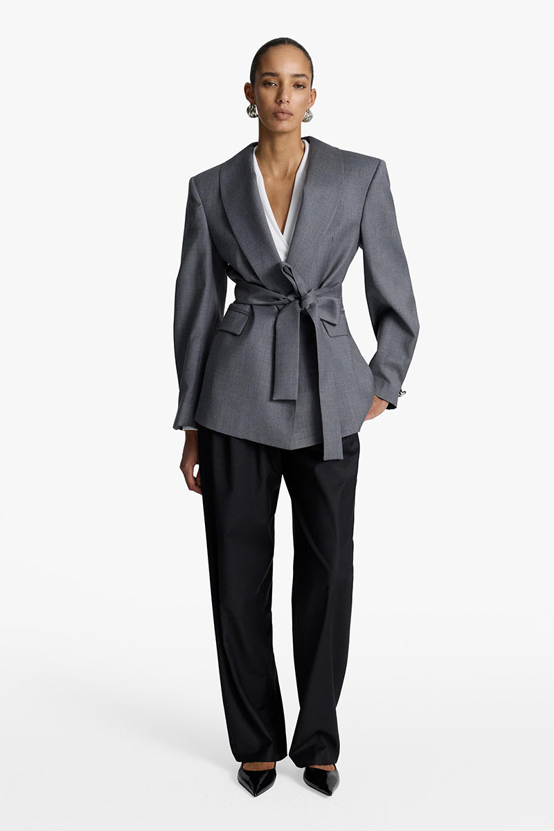 Black Wisdom Blazer by Acaria Studio, tailored fit with structured lapels, displayed on a mannequin.