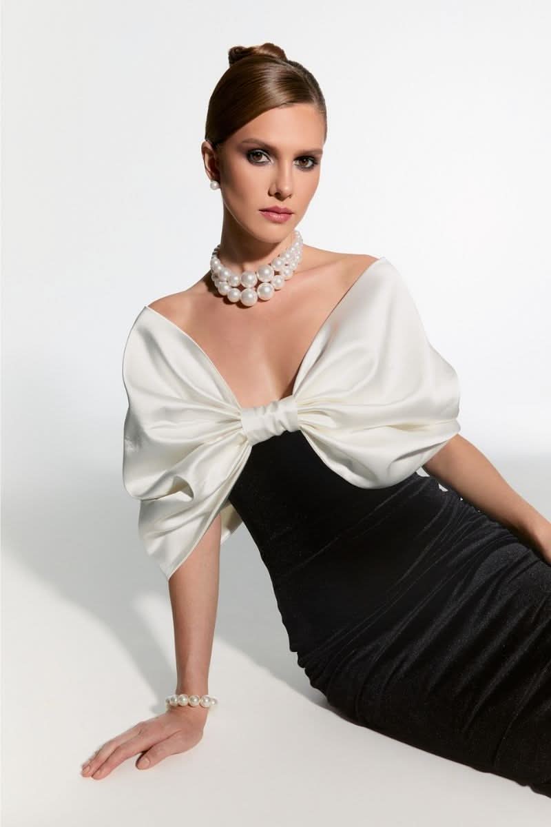 Nur Karaata CULT MIA X NUR KARAATA Buckingham gown, elegant evening gown with intricate details and luxurious fabric.
