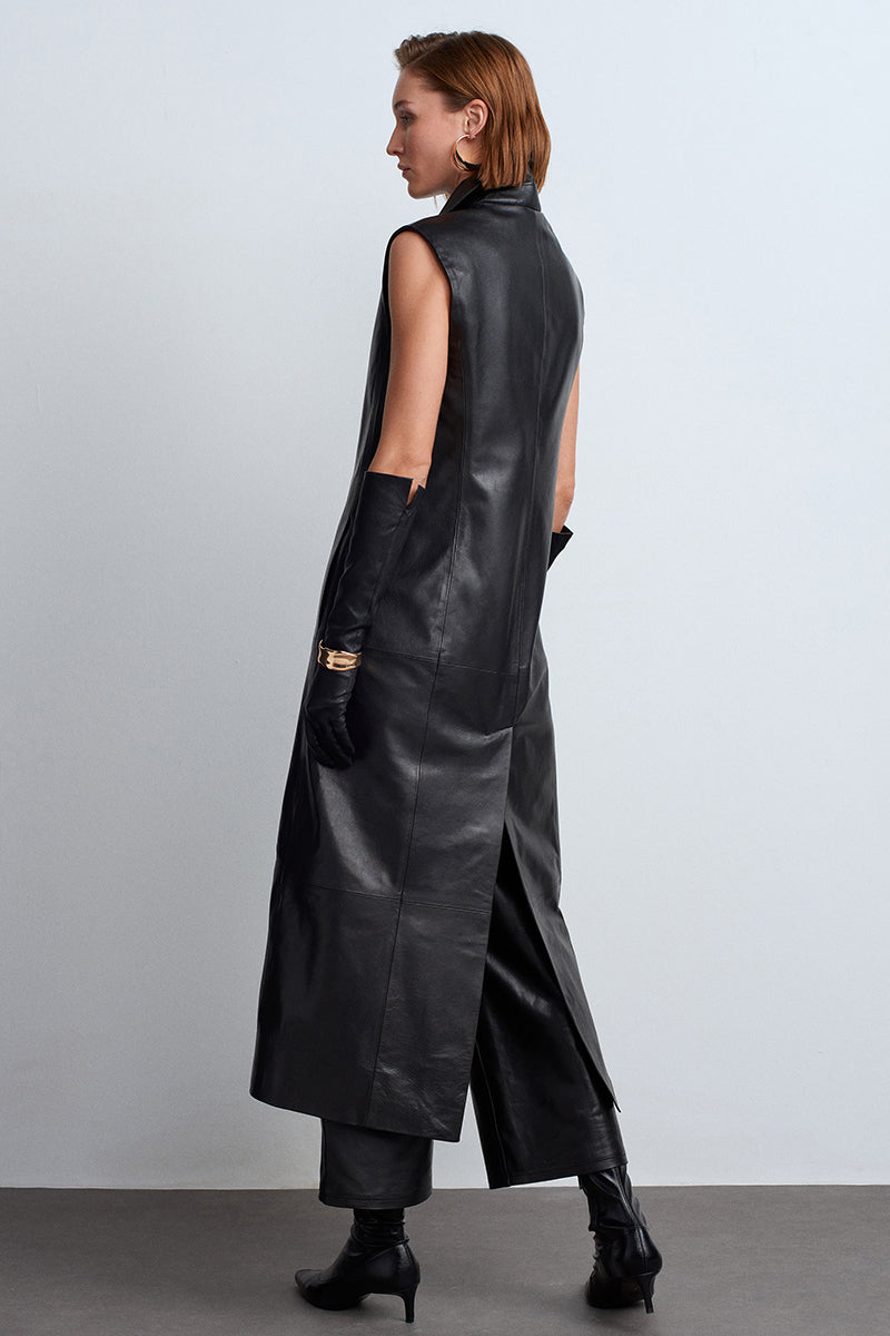 Black Mercury leather vest by Acaria Studio, showcasing a sleek, fitted design with detailed stitching and a smooth leather finish.
