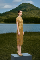 Le Thanh Hoa LITA SUNRISE beaded midi dress, elegant sleeveless design with intricate beadwork and flowing fabric, full-length view.