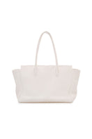 Off-white tote bag by Vikele Studio, shoulder bag with spacious interior and minimalist design, shown in a natural outdoor setting.
