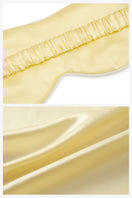 Soft butter yellow silk eye mask from Not Just Pajama, perfect for luxurious loungewear and relaxing sleep.