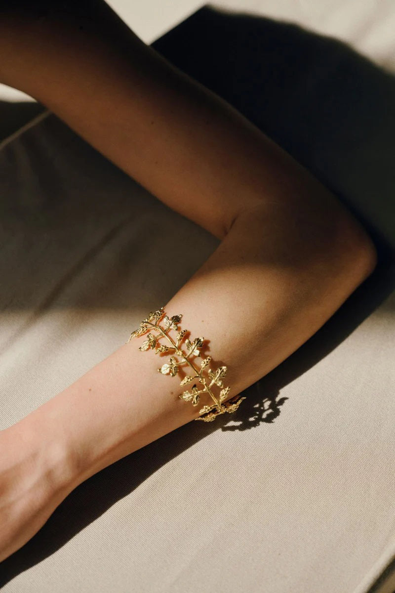 Peracas Carolina Cuff bracelet featuring a sleek, minimalist design with smooth metal finish, worn on a wrist.