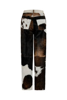 ZUT Ascot leather pants in black, close-up of sleek, fitted leather trousers with detailed stitching and zipper closure.