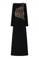Black velvet satin boat neck gown by Lune De Soie, featuring a smooth fabric and elegant boat neckline.