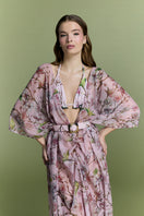 Nur Karaata Island Mirage cover up with lightweight, flowy fabric and tropical print, perfect for beach or poolside wear.