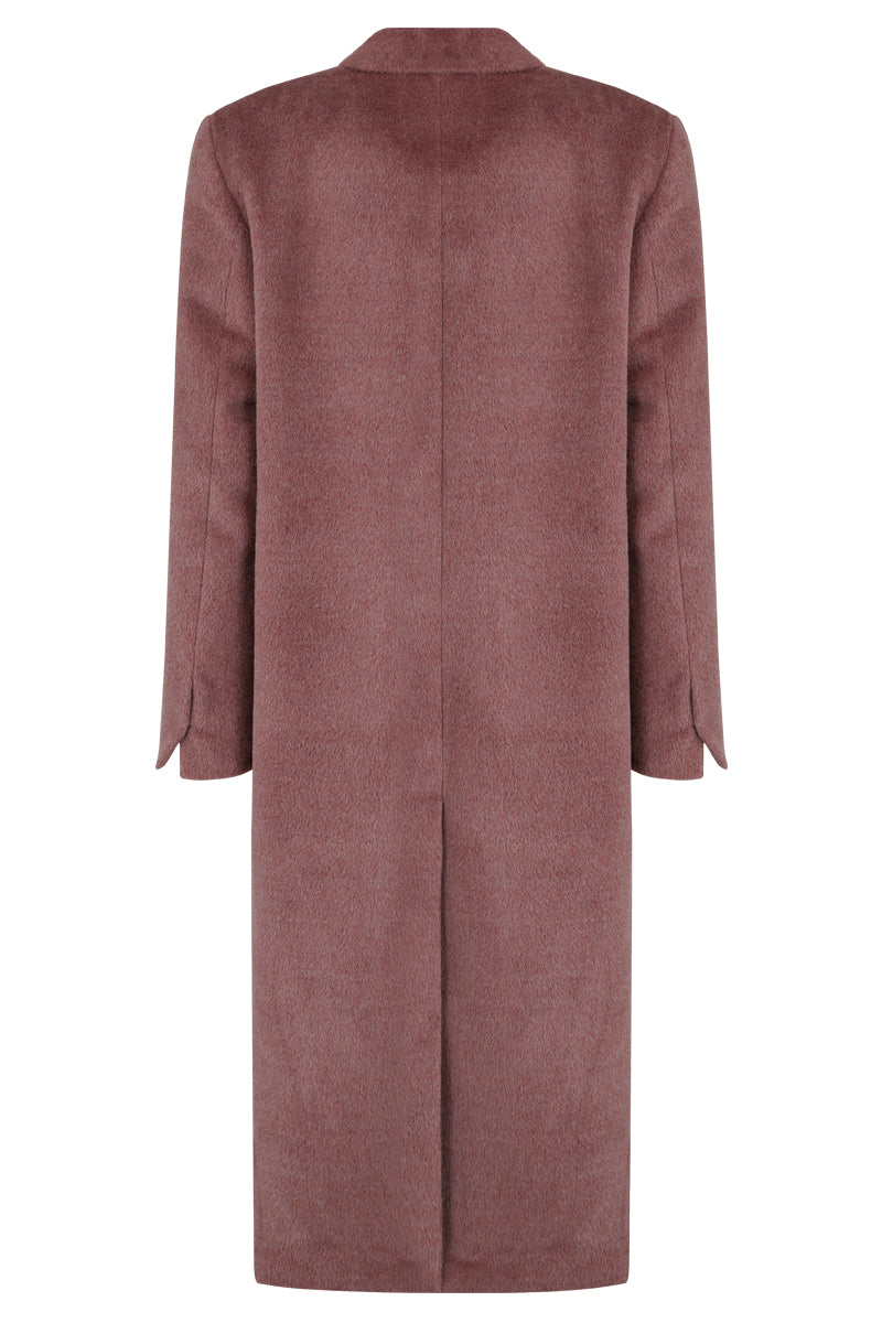 Pink oversized Suri alpaca coat by JINSUN displayed on a hanger, showcasing its plush texture and relaxed fit.