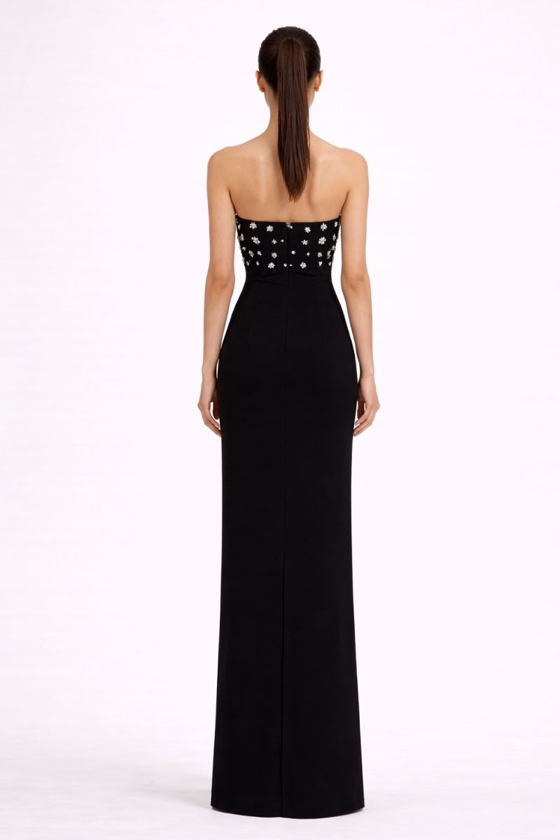 Nihan Peker Sabaa black gown with elegant flowing fabric and intricate detailing, perfect for formal occasions.