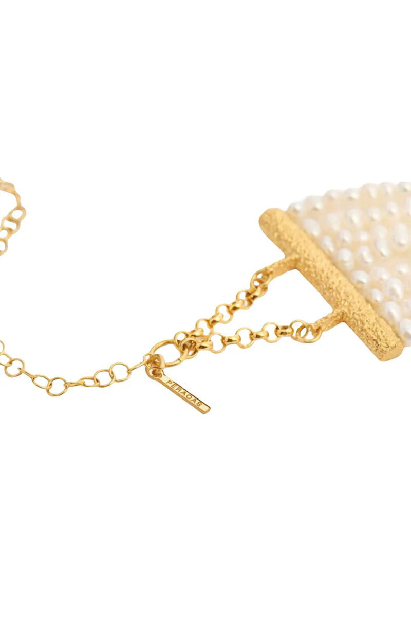 Peracas Patmos Waves Pearl Choker necklace with layered pearls and wave design on a white background.