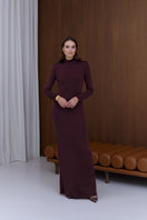 Undress Cintia open-back maxi dress in burgundy, flowing fabric with a deep V neckline and open back design.