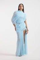 Deme By Gabriella Jovana draped blue maxi dress featuring flowing fabric and elegant design, perfect for formal occasions.
