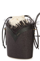 Black VIKELE STUDIO bucket bag with shoulder strap, showcasing its stylish design and compact shape.