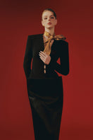 Elegant Heather gown by Margée Atelier featuring flowing fabric and intricate detailing, perfect for formal occasions.