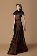 Black VINE GUIPURE lace gown by I.H.F featuring intricate lace details and a flowing elegant design.