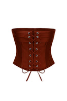Copper brown satin corset top by Nazlı Ceren with structured design and adjustable straps, styled on a mannequin.