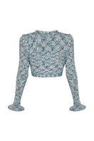 Lalo Sirena cardigan in blue, long-sleeve knit sweater with a relaxed fit and button-front closure, styled on a mannequin.