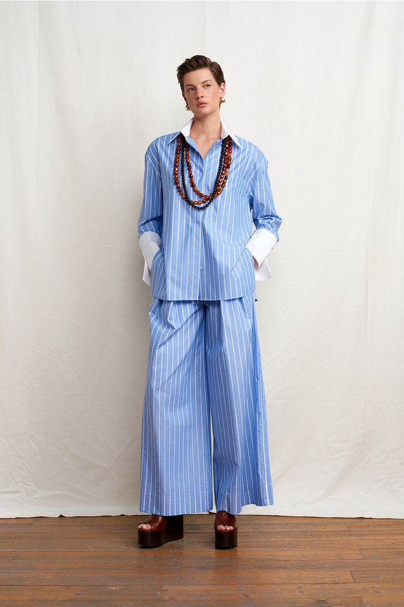 Blue Soul Pants by Acaria Studio featuring a relaxed fit and stylish design, shown on a model.