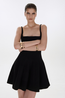 Black Balykina mini dress with thin straps, close-up view of the fitted style and smooth fabric.