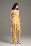 Yellow floral lace maxi dress by I.H.F Studio featuring intricate lace details and a flowing silhouette.