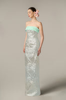Elegant green gown by I.H.F featuring metallic jacquard and silk taffeta fabric, with intricate detailing and a flowing silhouette.